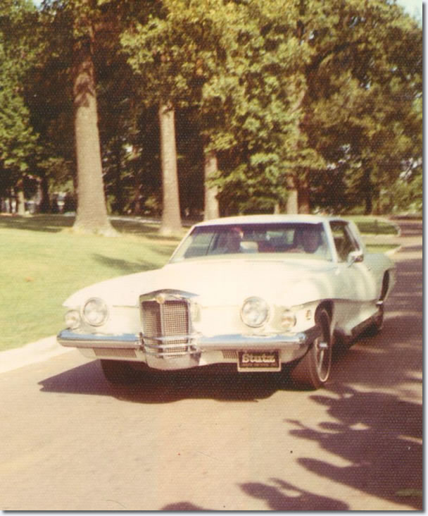 Elvis driving his 1972 Stutz Blackhawk at Graceland