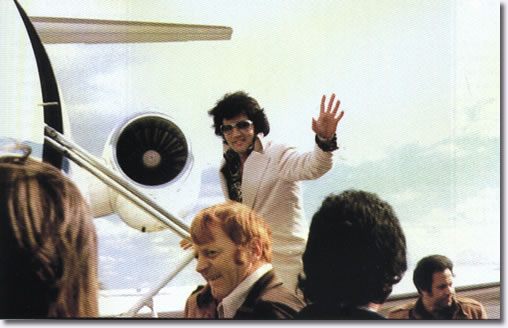 Elvis boarding Airplane